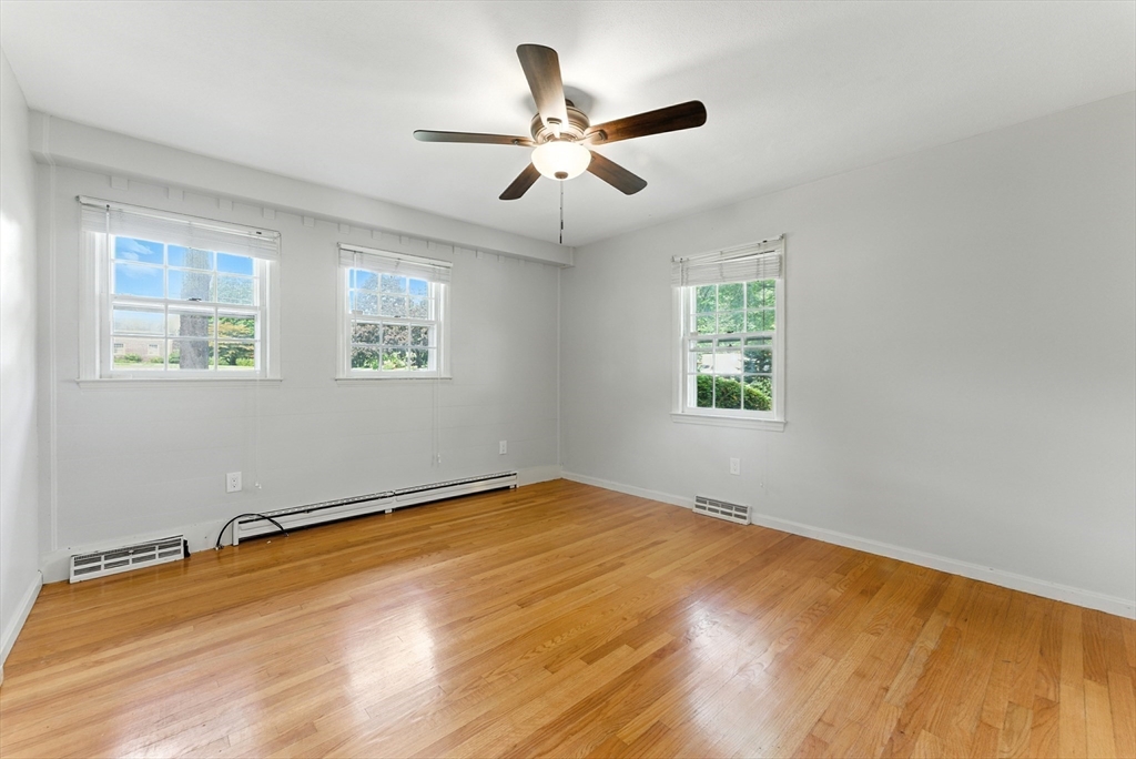 925 Williams Street Longmeadow, MA 01106 - Photo 25 of 38 a view of an empty room with wooden floor and a window