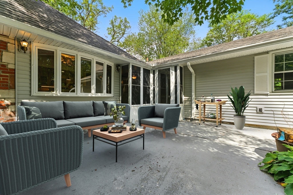 925 Williams Street Longmeadow, MA 01106 - Photo 29 of 38 a view of a patio with a chairs and table in a patio