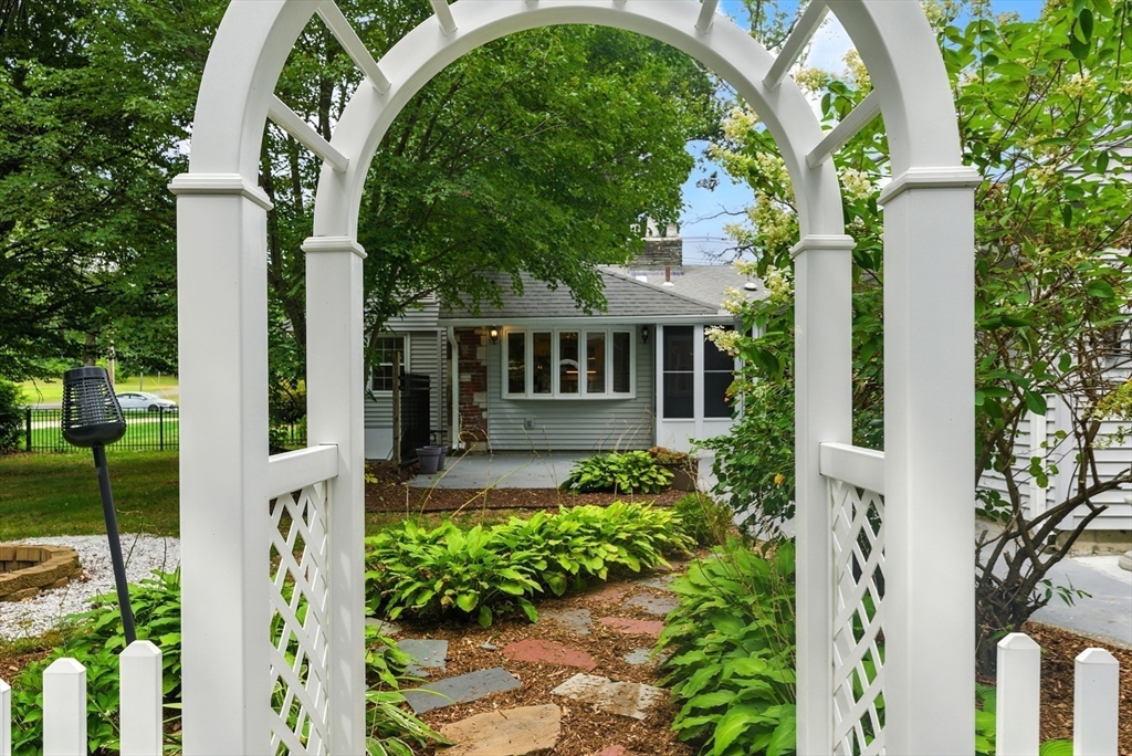 925 Williams Street Longmeadow, MA 01106 - Photo 31 of 38 a front view of a house with a garden