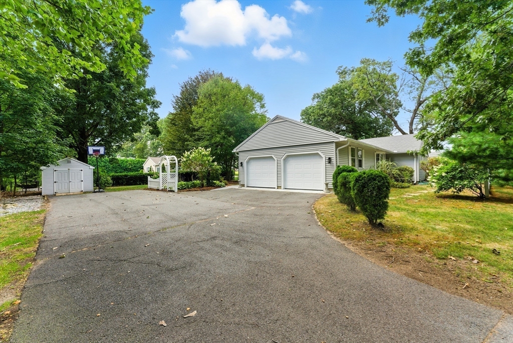 925 Williams Street Longmeadow, MA 01106 - Photo 33 of 38 a view of a house with backyard and a tree