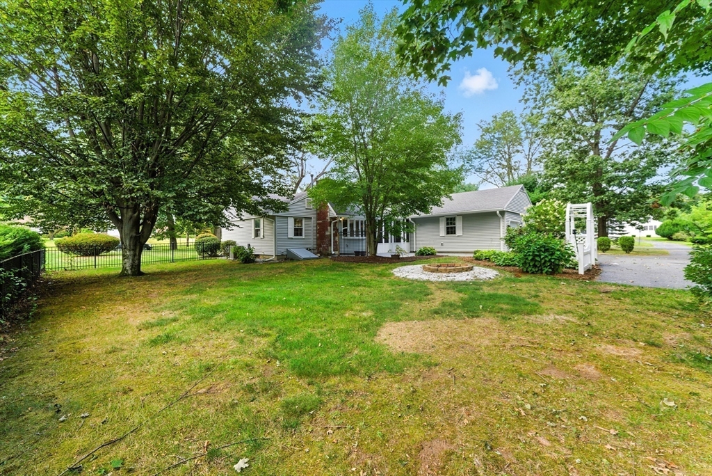 925 Williams Street Longmeadow, MA 01106 - Photo 35 of 38 a front view of a house with yard and green space