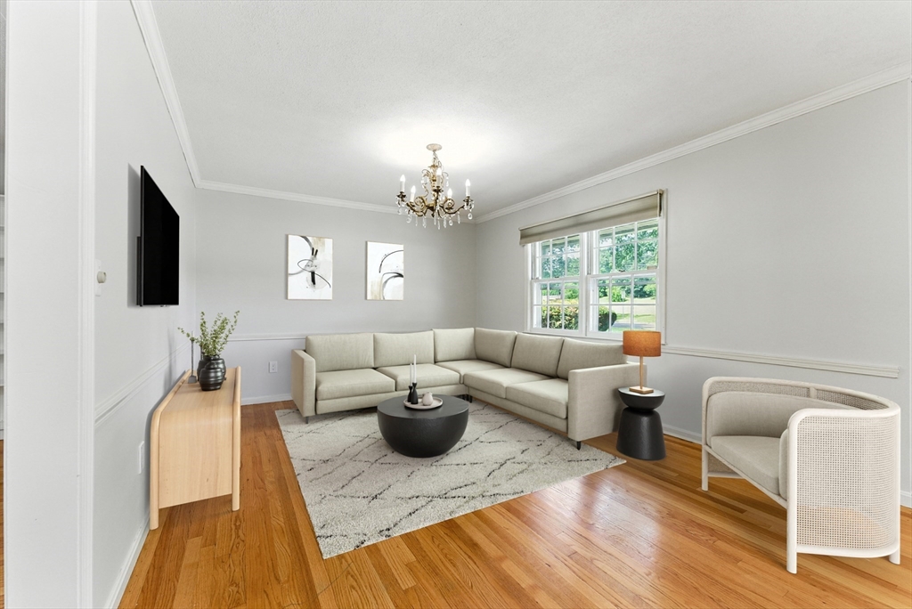 925 Williams Street Longmeadow, MA 01106 - Photo 4 of 38 a living room with furniture and a chandelier
