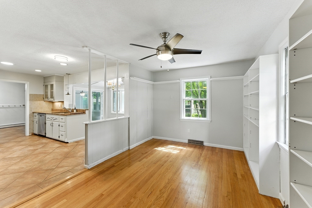 925 Williams Street Longmeadow, MA 01106 - Photo 8 of 38 a view of a kitchen with wooden floor and a window
