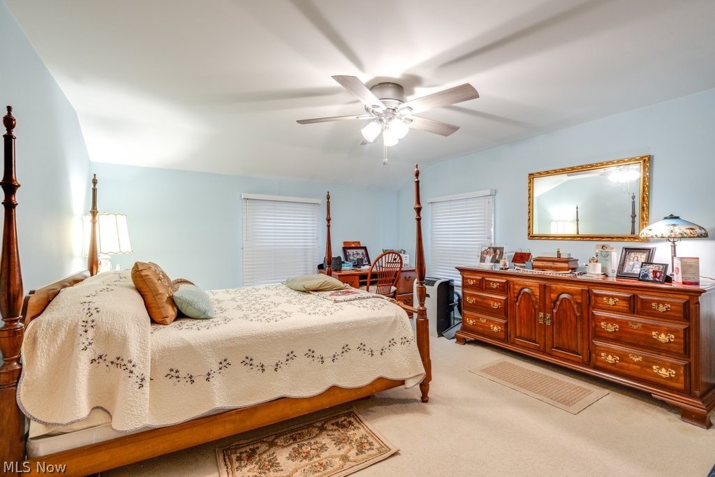 5981 Wiclif Road Northeast Canton, OH 44721 - Photo 22 of 50 Bedroom with light colored carpet and ceiling fan