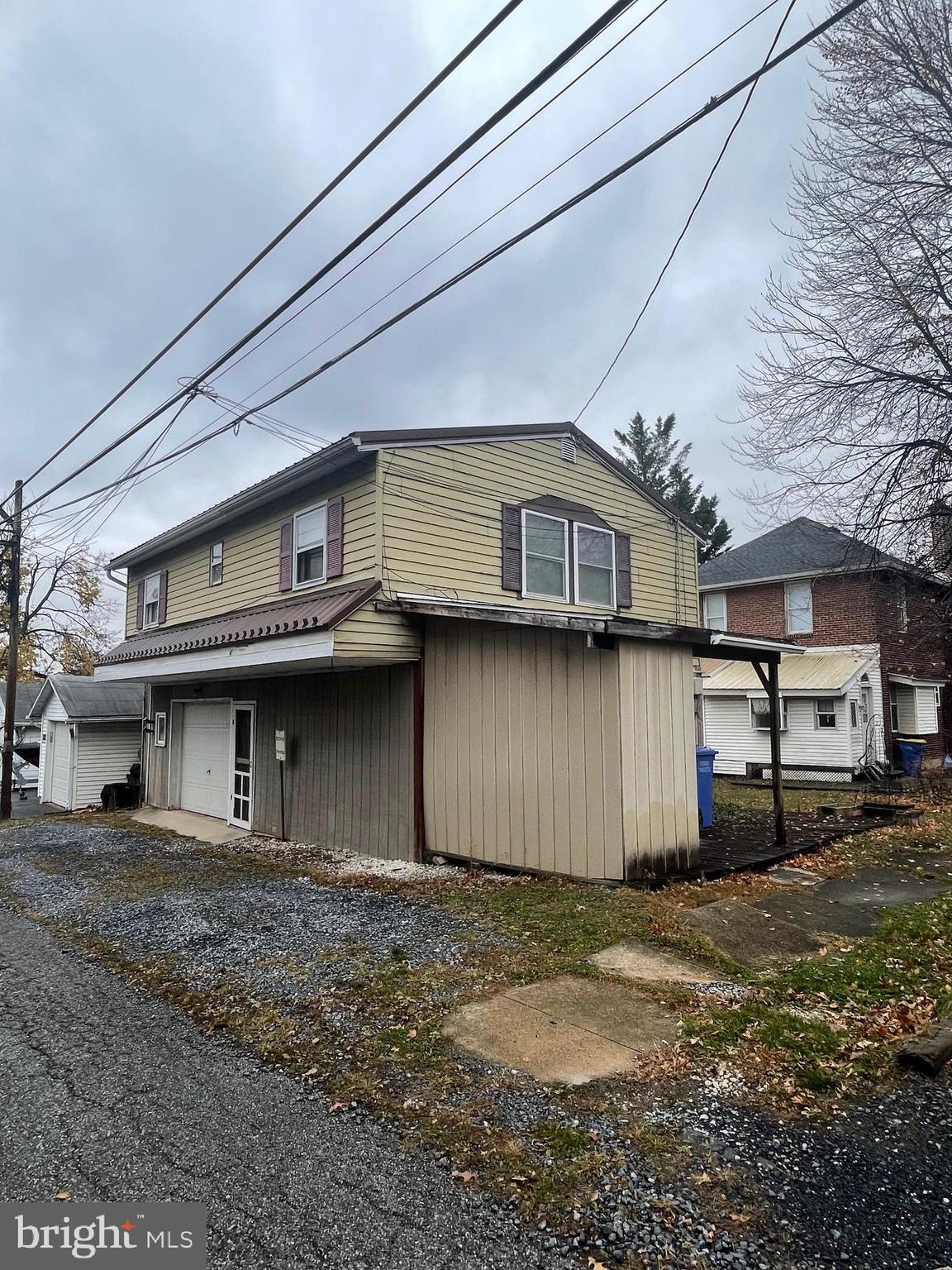 425 Rear Seventh Street New Cumberland, PA 17070 - Photo 4 of 23 a front view of a house with a yard