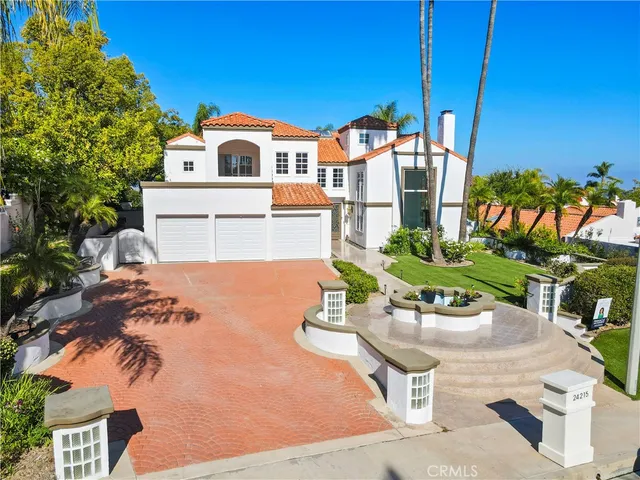a view of a balcony with a potted plants