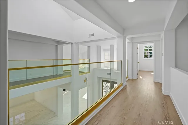 a view of a city with lush green forest