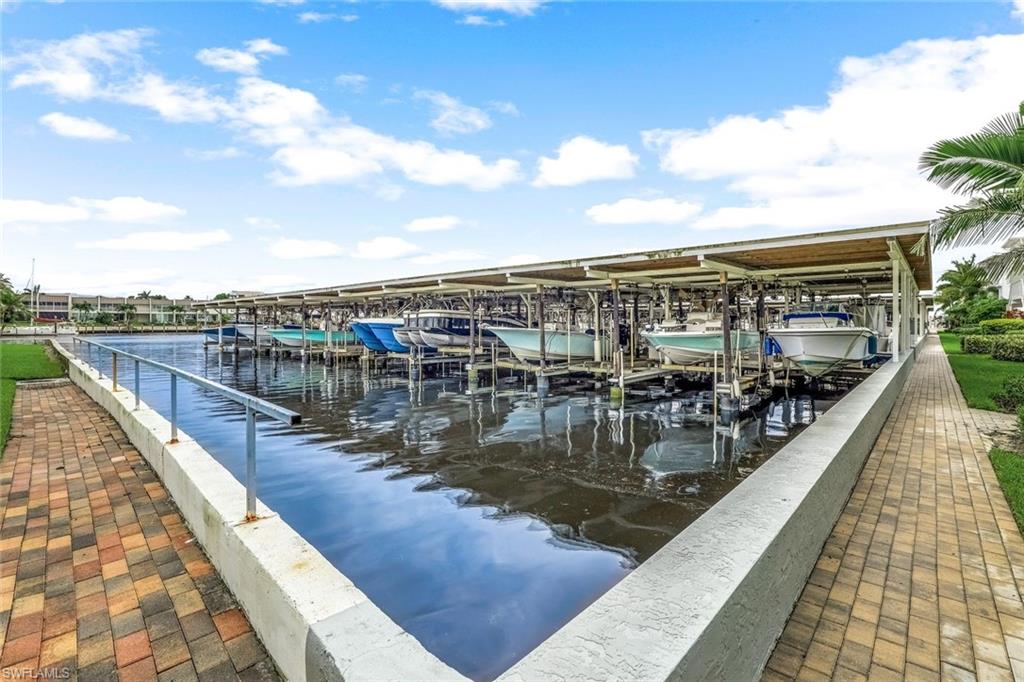1100 8th Avenue South, Unit H227 Naples, FL 34102 - Photo 21 of 22 a view of a lake