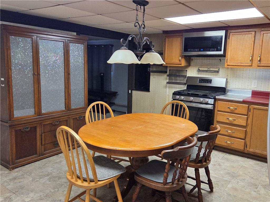1930 Branchton Road Hilliards, PA 16040 - Photo 11 of 27 a table and chairs in a kitchen