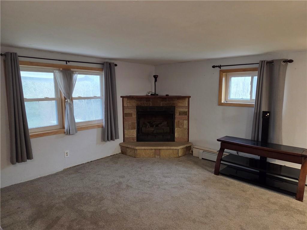 1930 Branchton Road Hilliards, PA 16040 - Photo 13 of 27 a living room with furniture and a fireplace