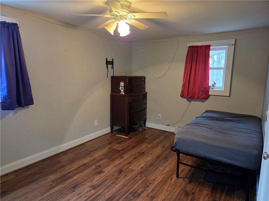 1930 Branchton Road Hilliards, PA 16040 - Photo 23 of 27 a view of a room with wooden floor window and a chandelier
