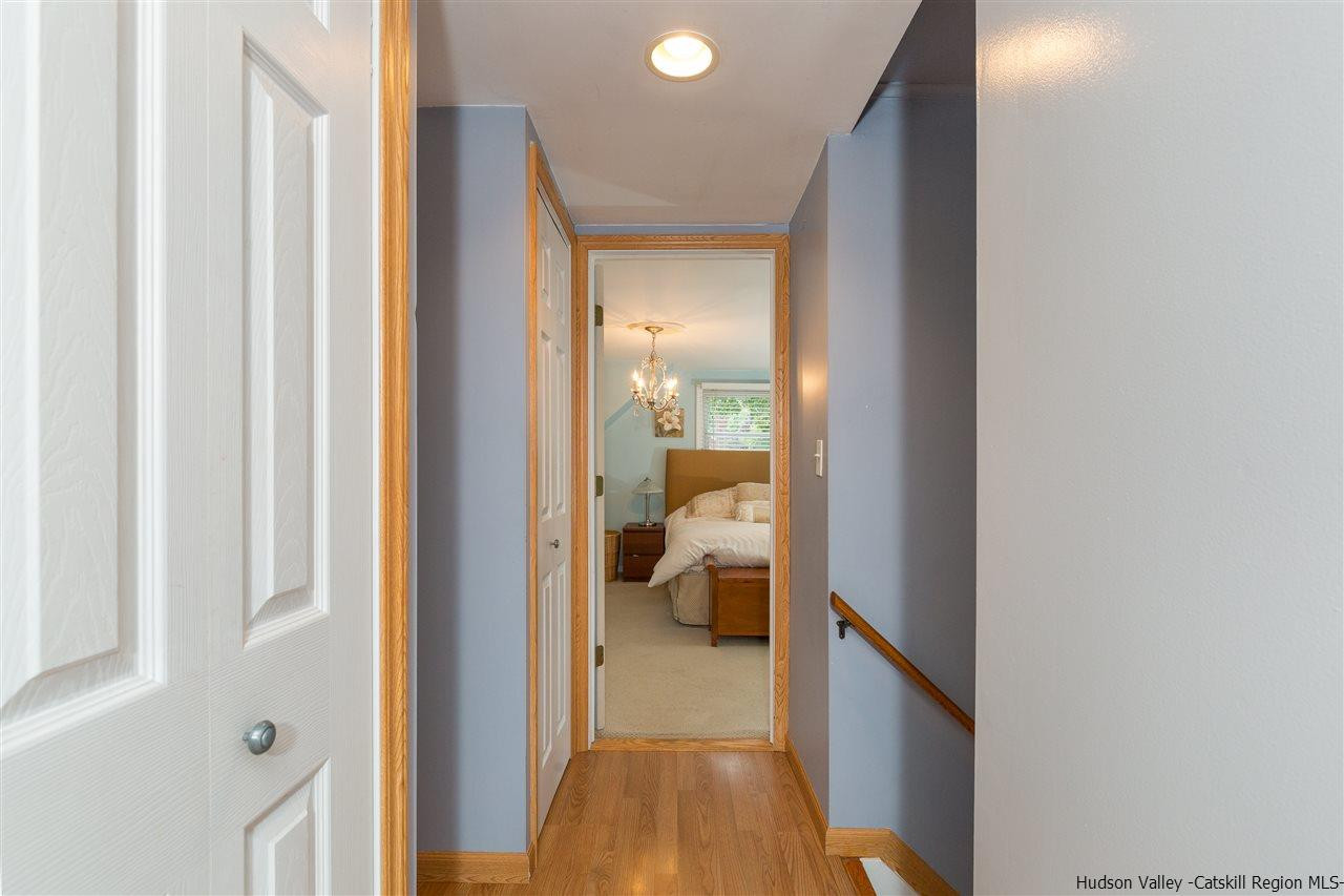 6 Van Road Fishkill, NY 12524 - Photo 23 of 23 a view of a hallway with white walls and living room