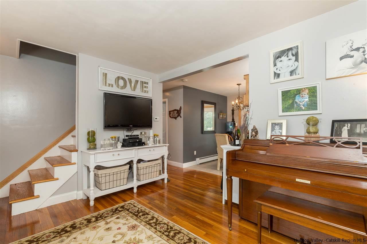 6 Van Road Fishkill, NY 12524 - Photo 5 of 23 a living room with furniture and a flat screen tv