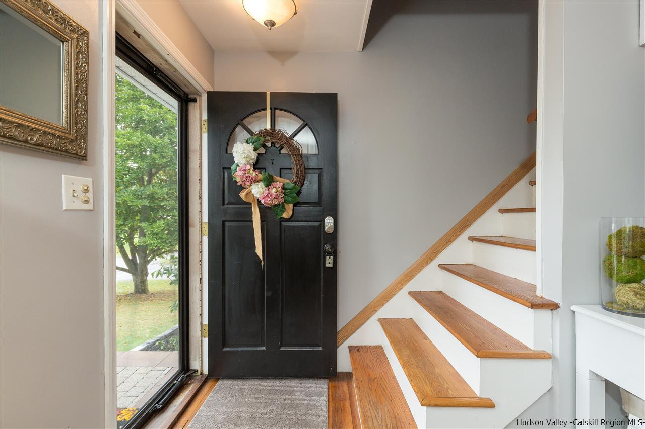 6 Van Road Fishkill, NY 12524 - Photo 6 of 23 a view of hallway with wooden floor and windows
