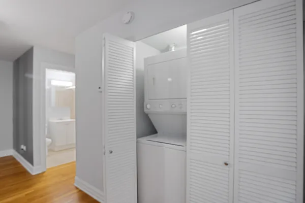 a bathroom with a toilet and a sink