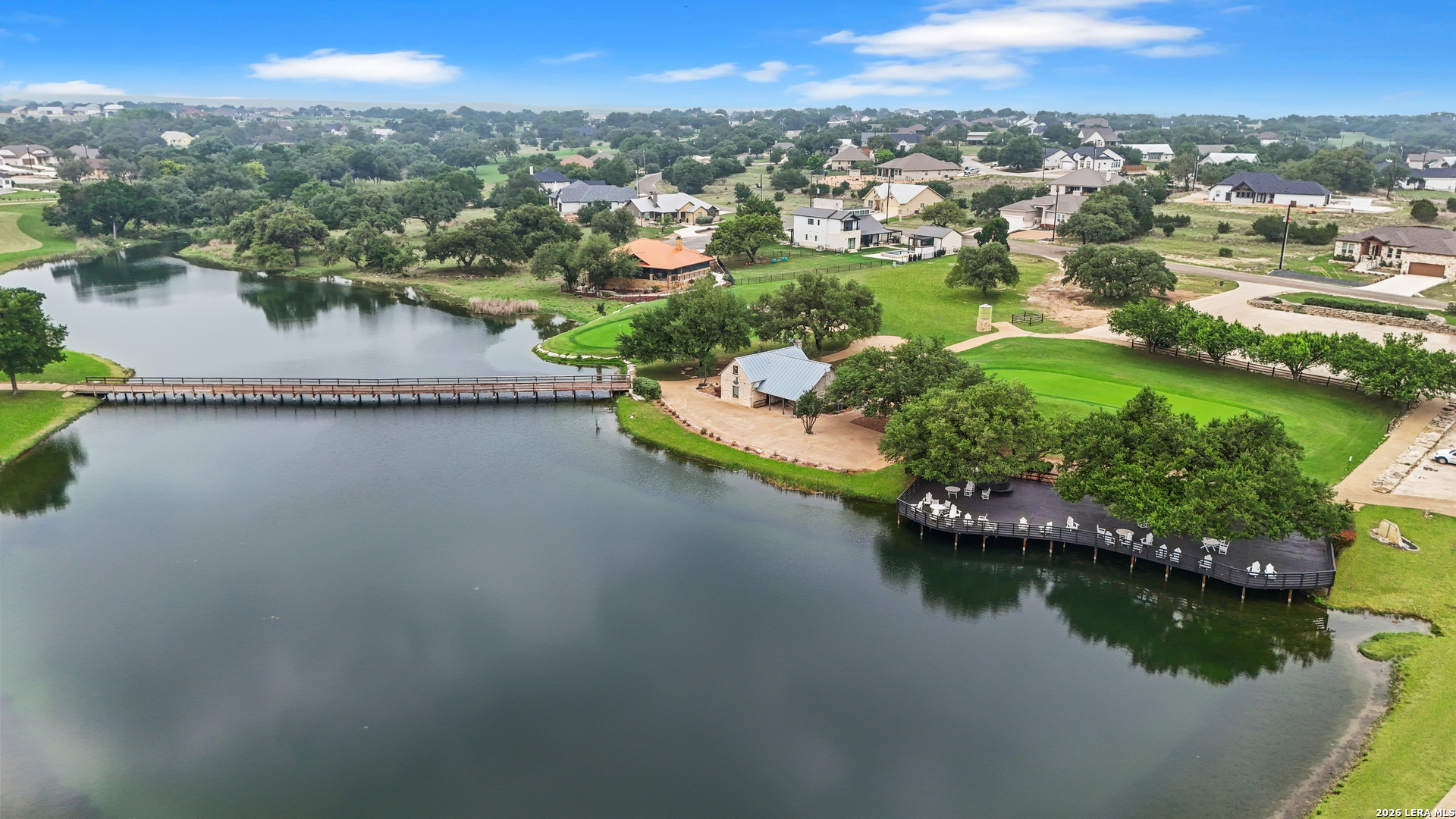 116 Hiram Cook Blanco, TX 78606 - Photo 47 of 53 an aerial view of residential houses with outdoor space and lake view