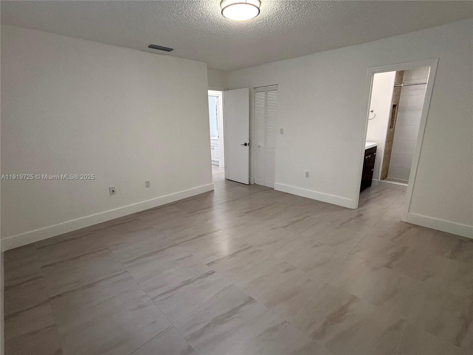 3616 Southwest 17th Street, Unit 3616 Miami, FL 33145 - Photo 8 of 16 a view of an empty room