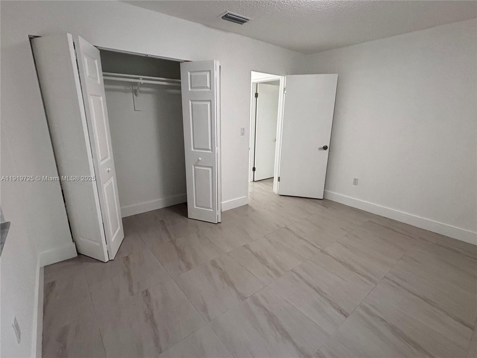 3616 Southwest 17th Street, Unit 3616 Miami, FL 33145 - Photo 9 of 16 a view of an empty room