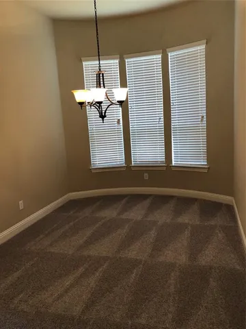 a view of a room with a window