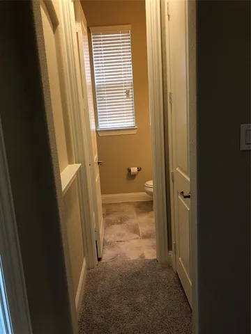 a bathroom with a sink a bathtub and window