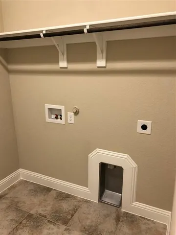 a view of a backyard with wooden fence