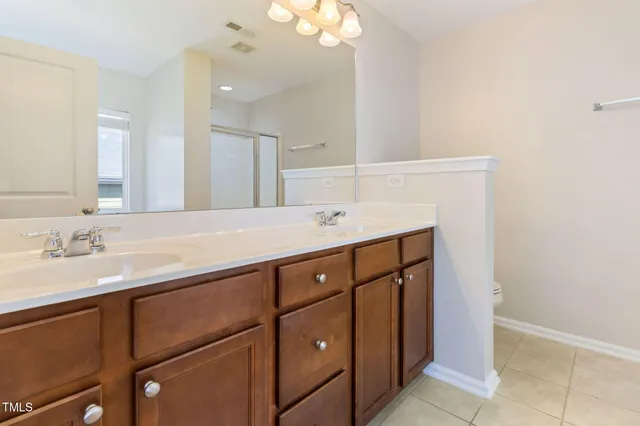 a bathroom with a bathtub and a window