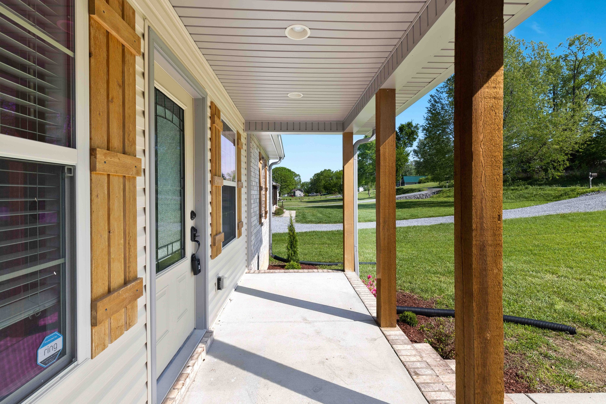 1821 Rock Bridge Road Bethpage, TN 37022 - Photo 28 of 31 a porch with a table and chairs