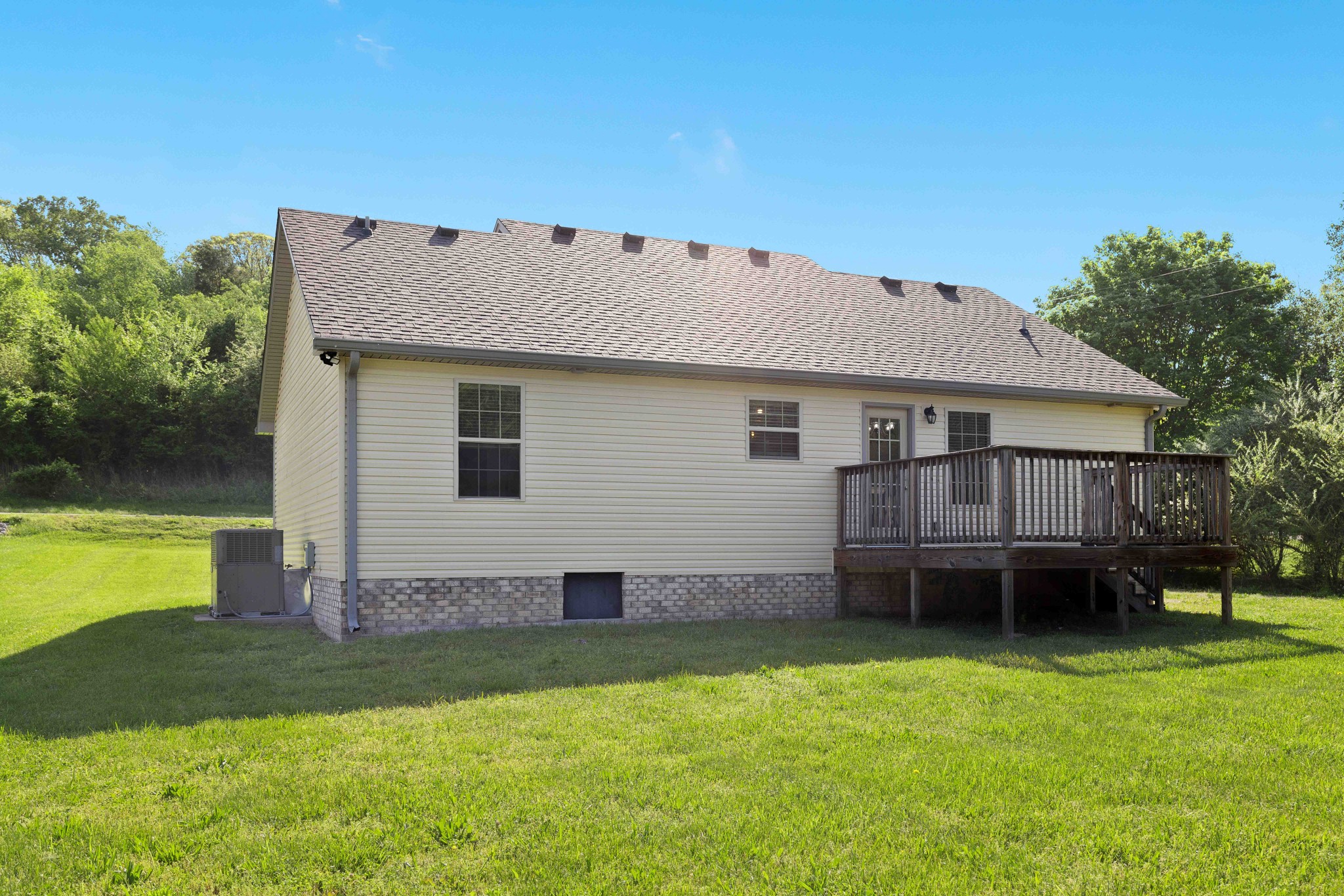 1821 Rock Bridge Road Bethpage, TN 37022 - Photo 29 of 31 a view of a backyard with a garden and plants