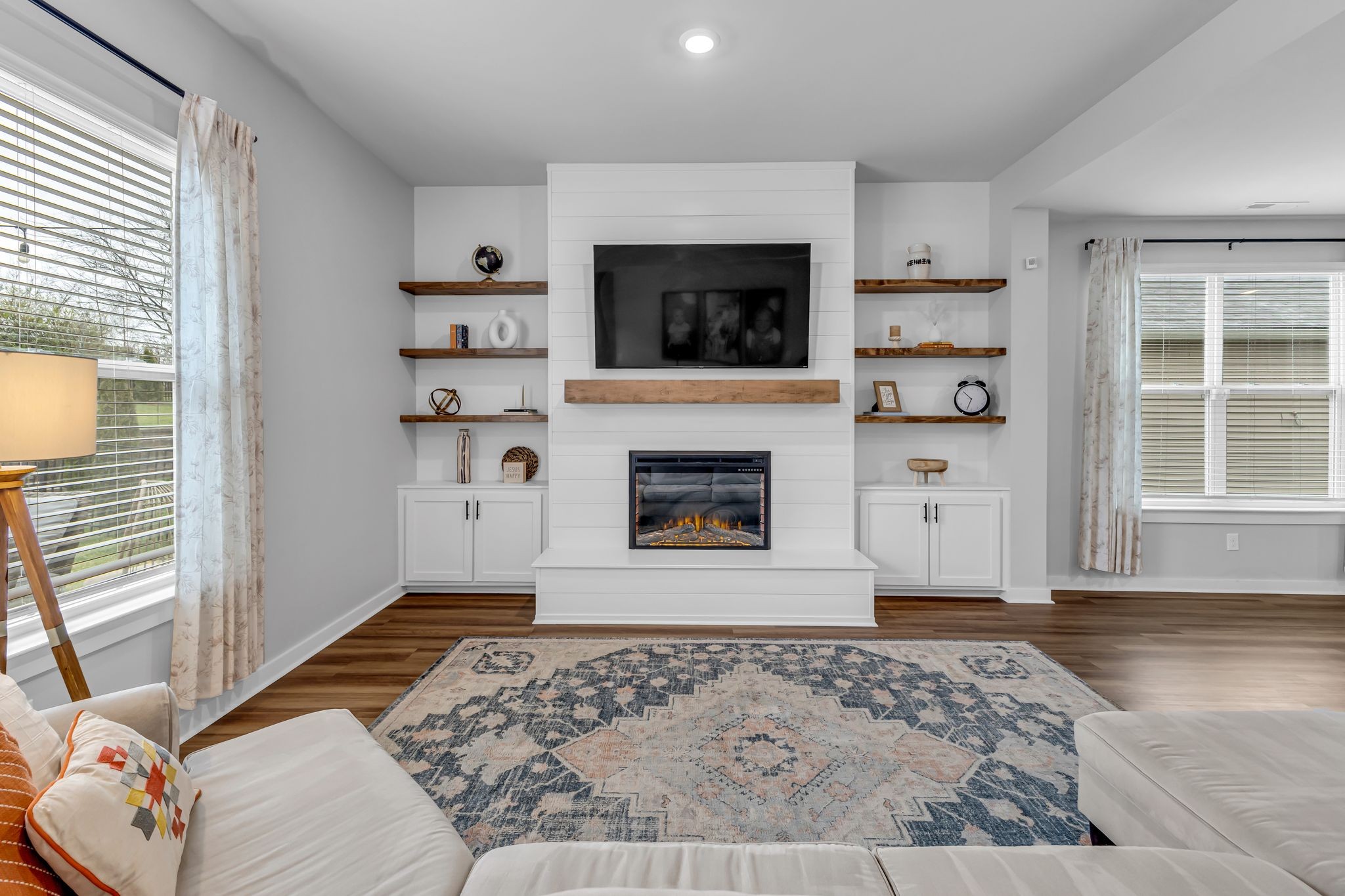 417 Irwin Way Spring Hill, TN 37174 - Photo 12 of 43 a living room with furniture and a fireplace