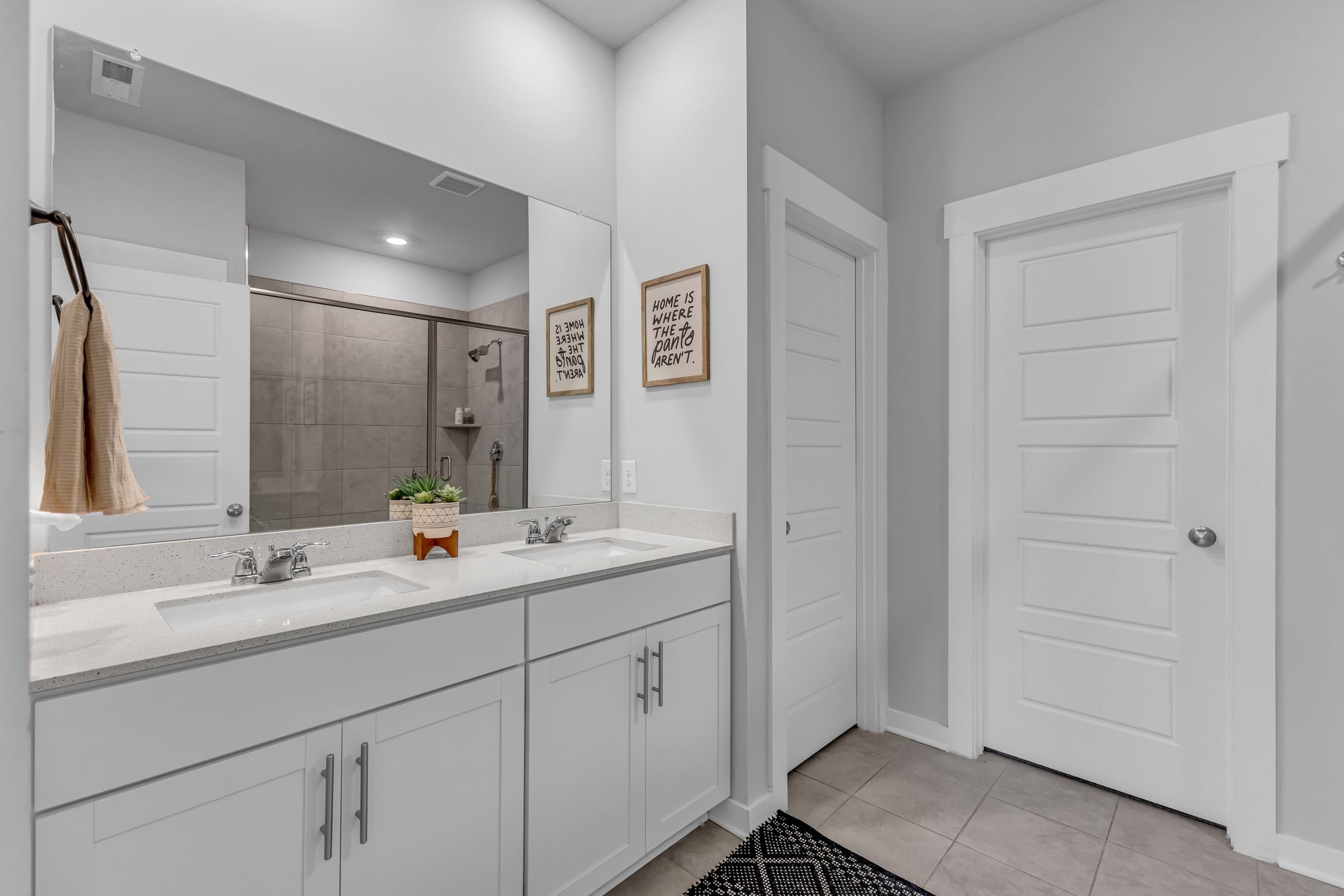 417 Irwin Way Spring Hill, TN 37174 - Photo 21 of 43 a bathroom with double sink and a mirror