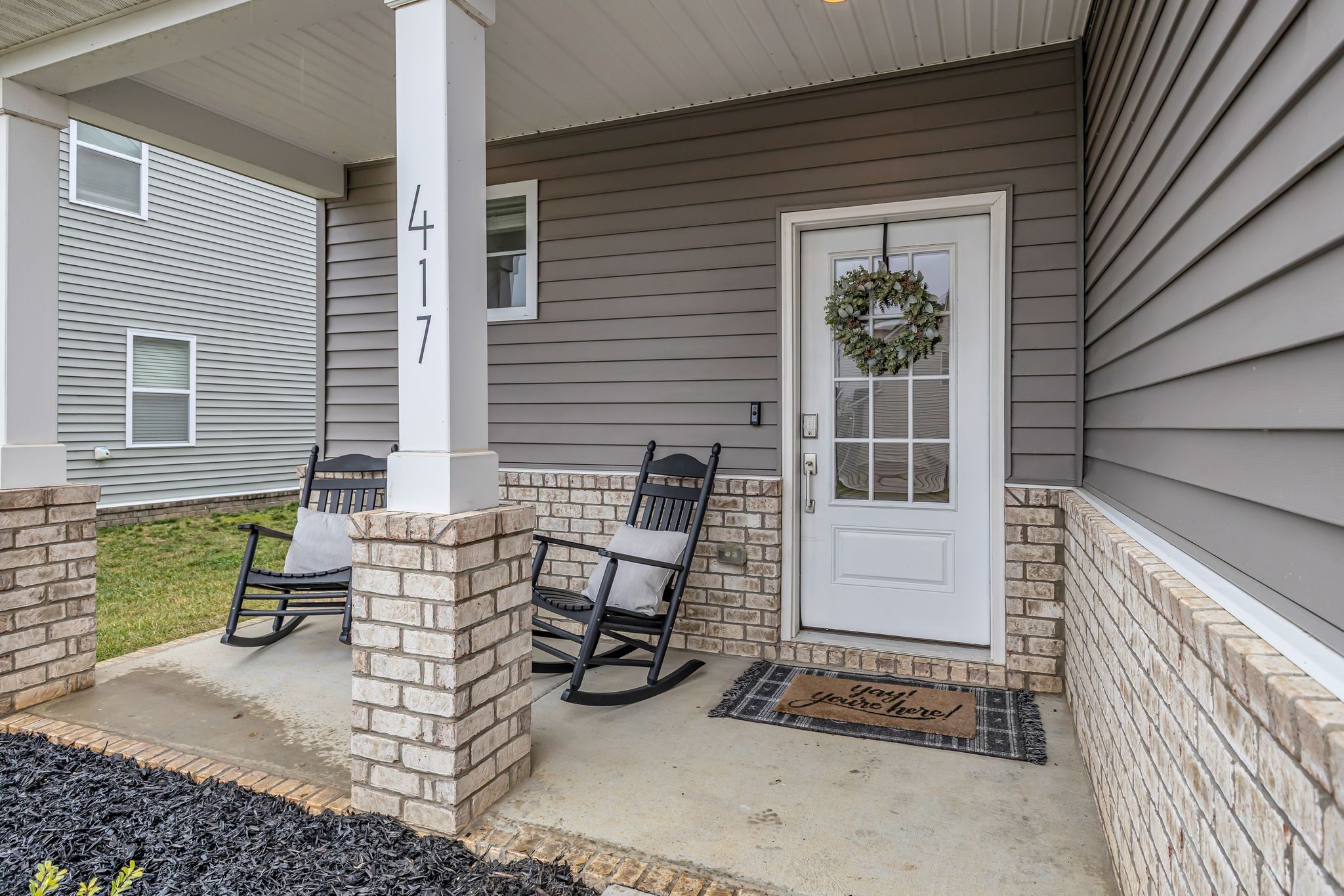 417 Irwin Way Spring Hill, TN 37174 - Photo 4 of 43 a view of two chairs in the balcony