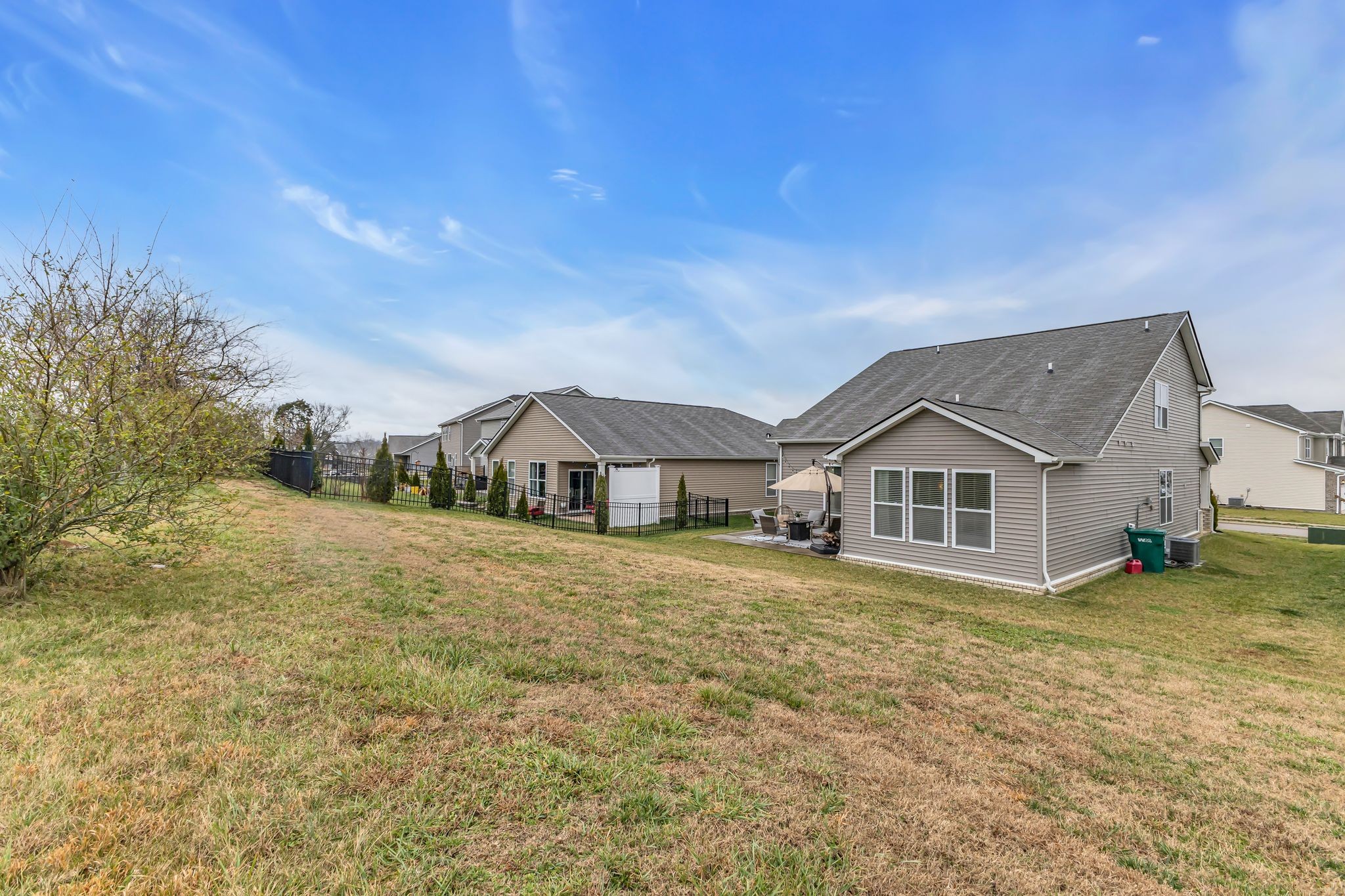 417 Irwin Way Spring Hill, TN 37174 - Photo 41 of 43 a view of a house with a yard