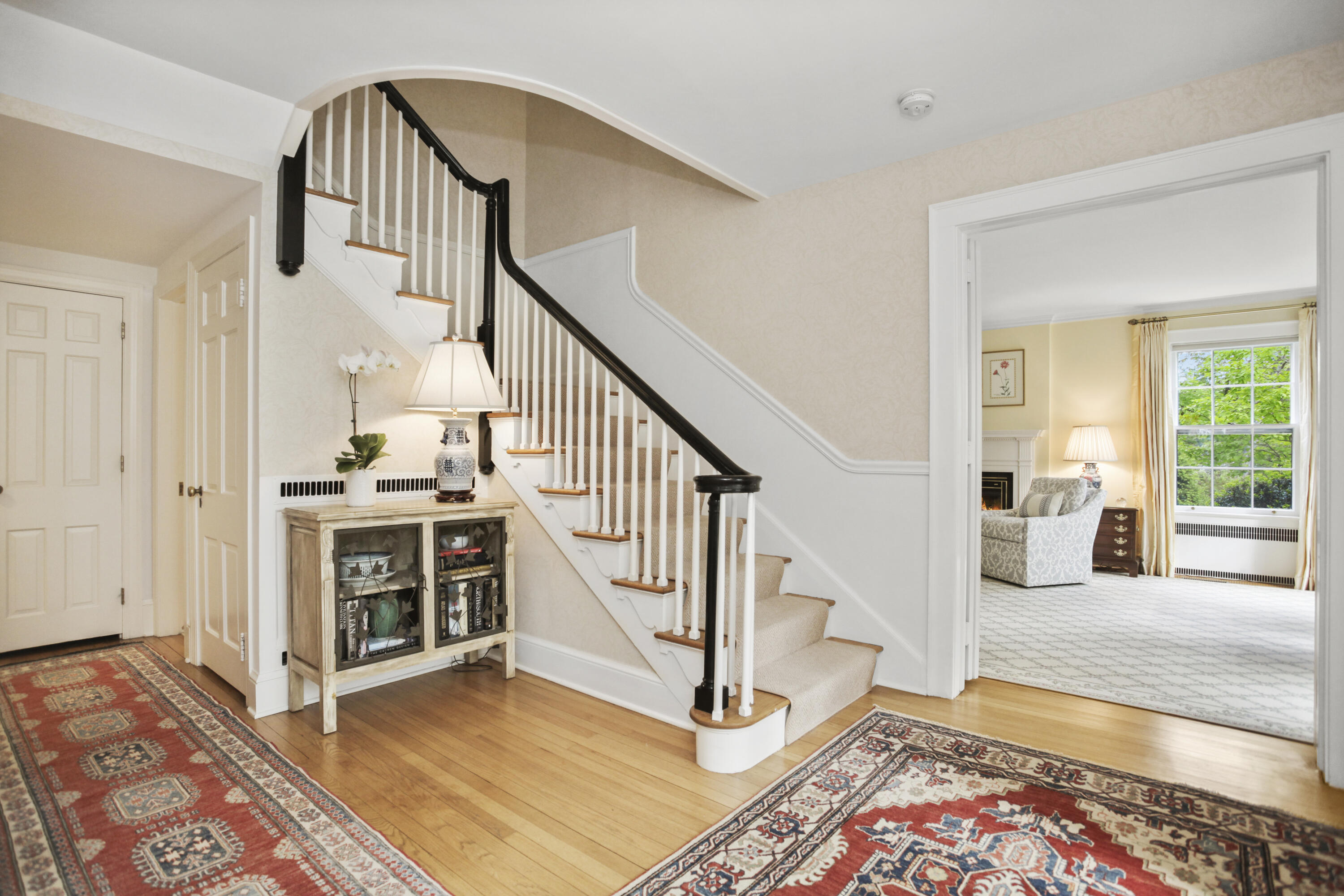 40 Birch Road Darien, CT 06820 - Photo 12 of 40 a view of entryway livingroom and hall with wooden floor