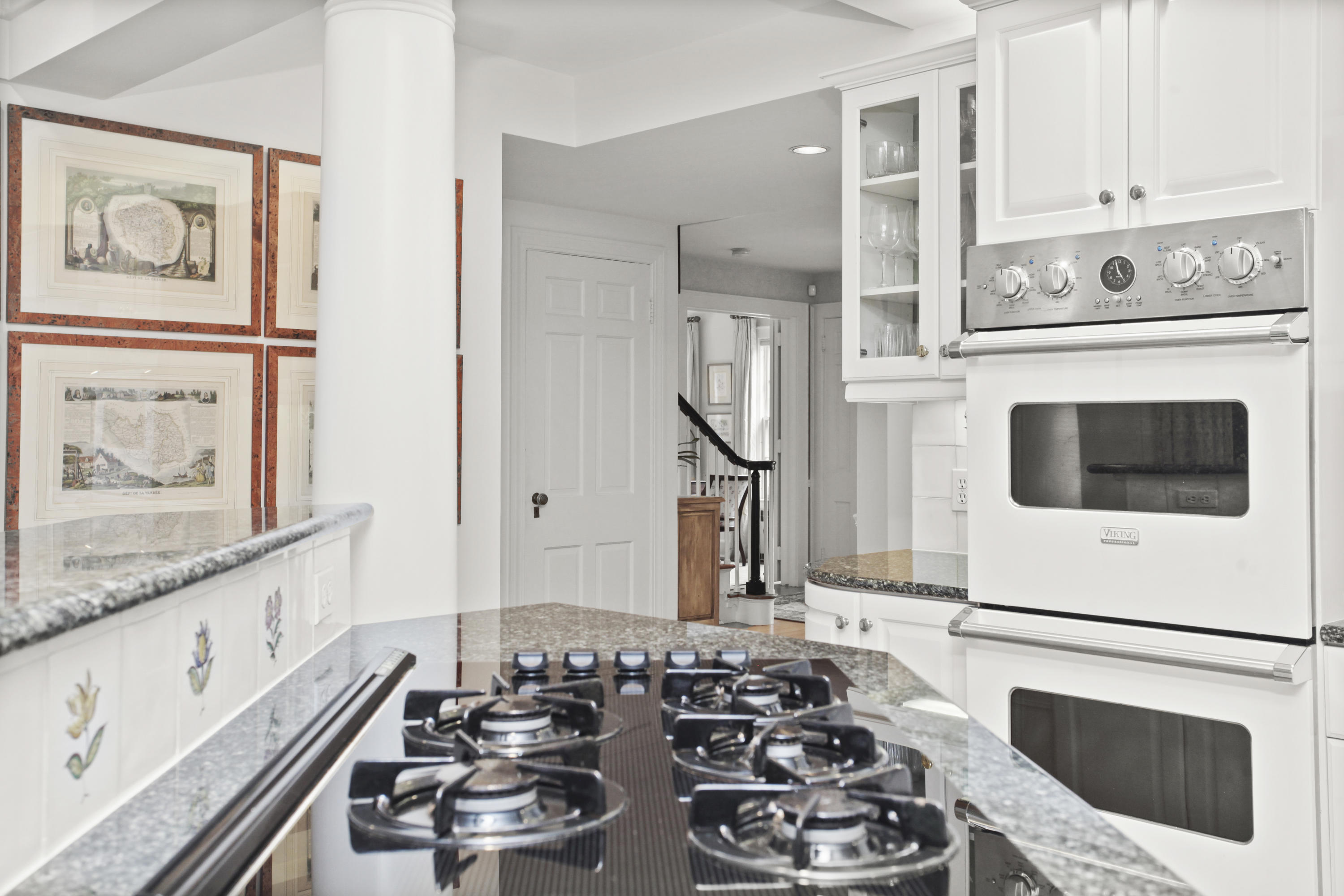 40 Birch Road Darien, CT 06820 - Photo 22 of 40 a kitchen with sink stove and white cabinets