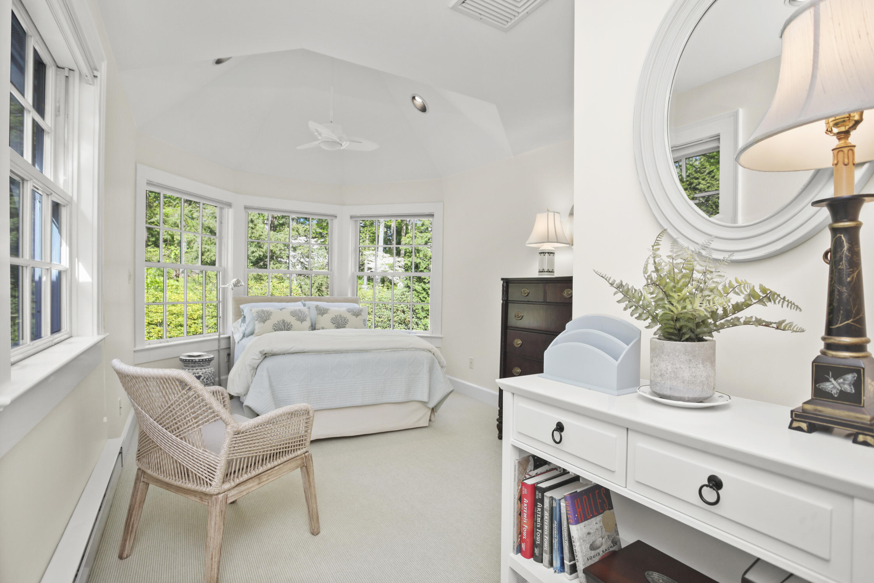 40 Birch Road Darien, CT 06820 - Photo 29 of 40 a living room with furniture a fireplace and a large window