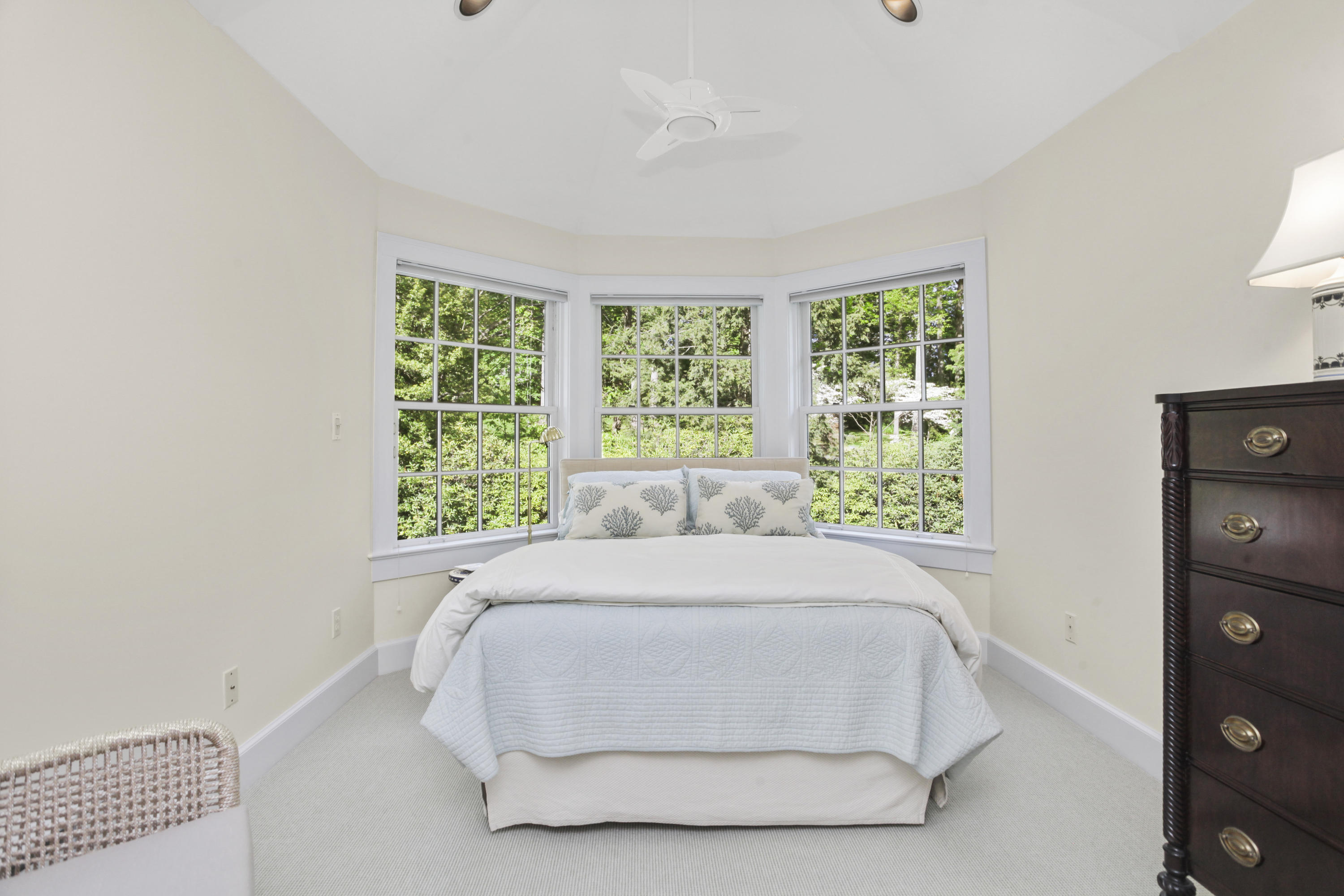 40 Birch Road Darien, CT 06820 - Photo 30 of 40 a bedroom with a bed and a large window