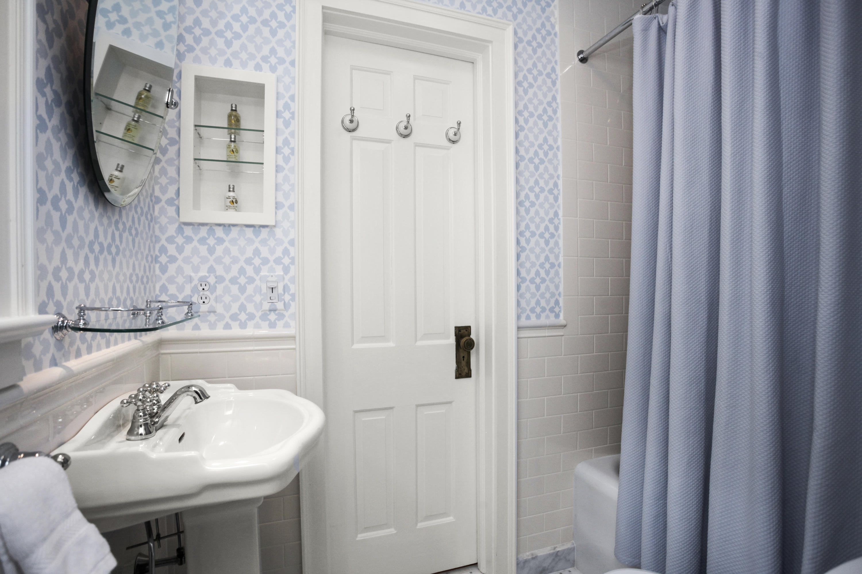 40 Birch Road Darien, CT 06820 - Photo 32 of 40 a bathroom with a sink and a mirror