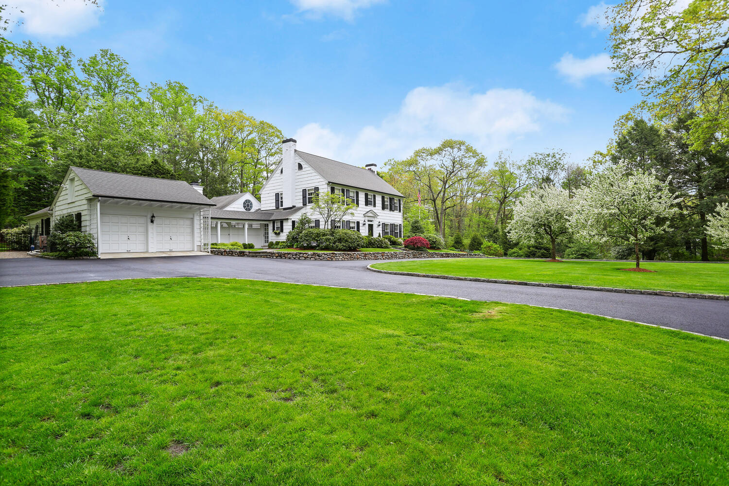 40 Birch Road Darien, CT 06820 - Photo 40 of 40 a front view of house with yard and green space