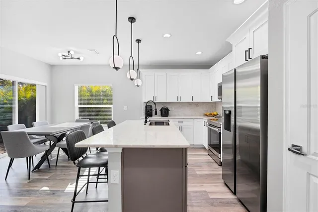 a utility room with dryer washer and the view