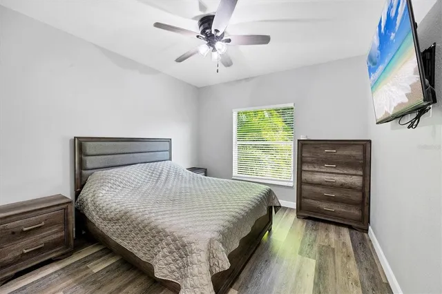 a view of grassy field with benches