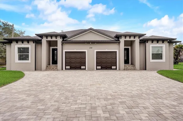 a kitchen with a refrigerator and a window