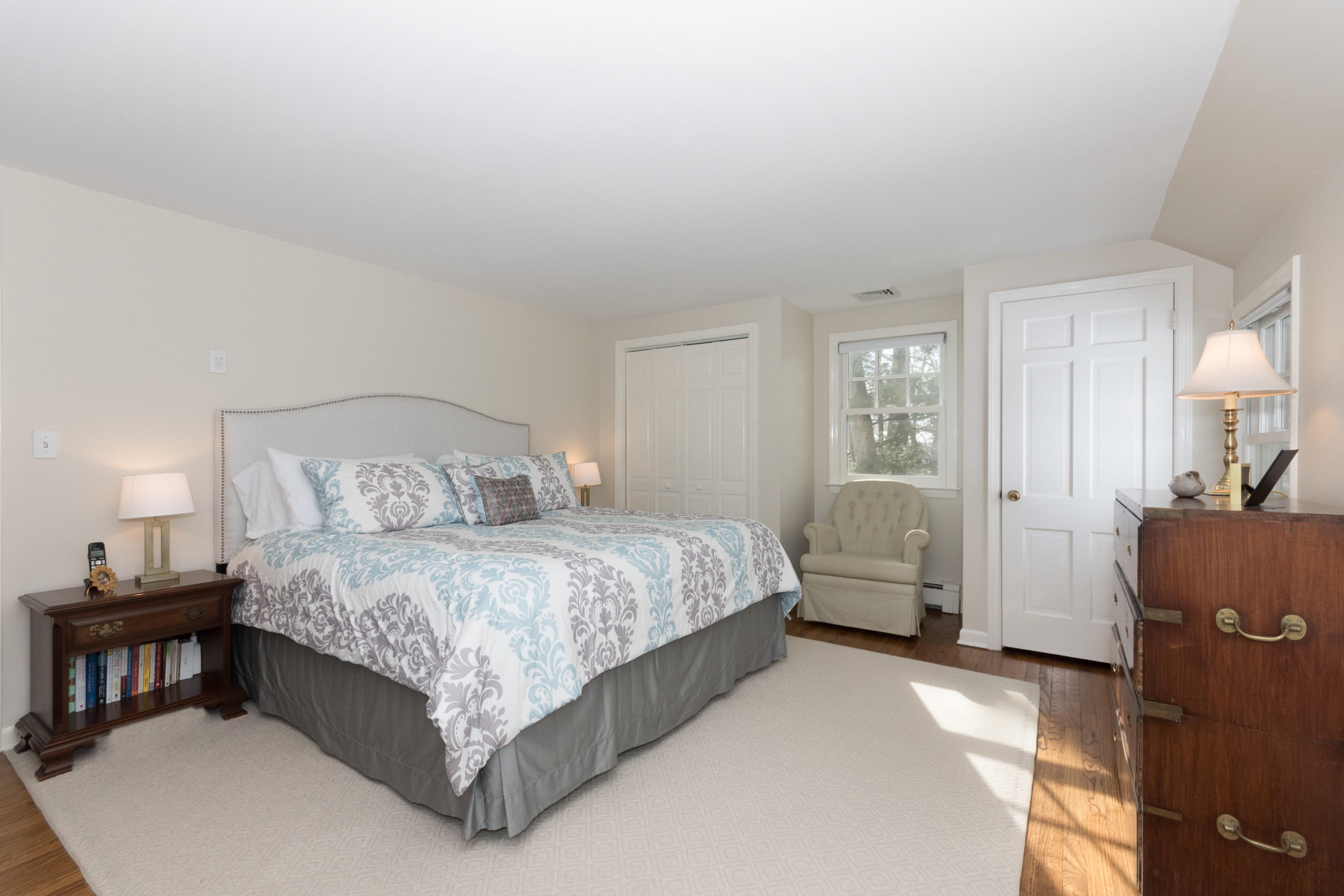 17 Country Club Road Darien, CT 06820 - Photo 15 of 37 a bedroom with a bed and a couch