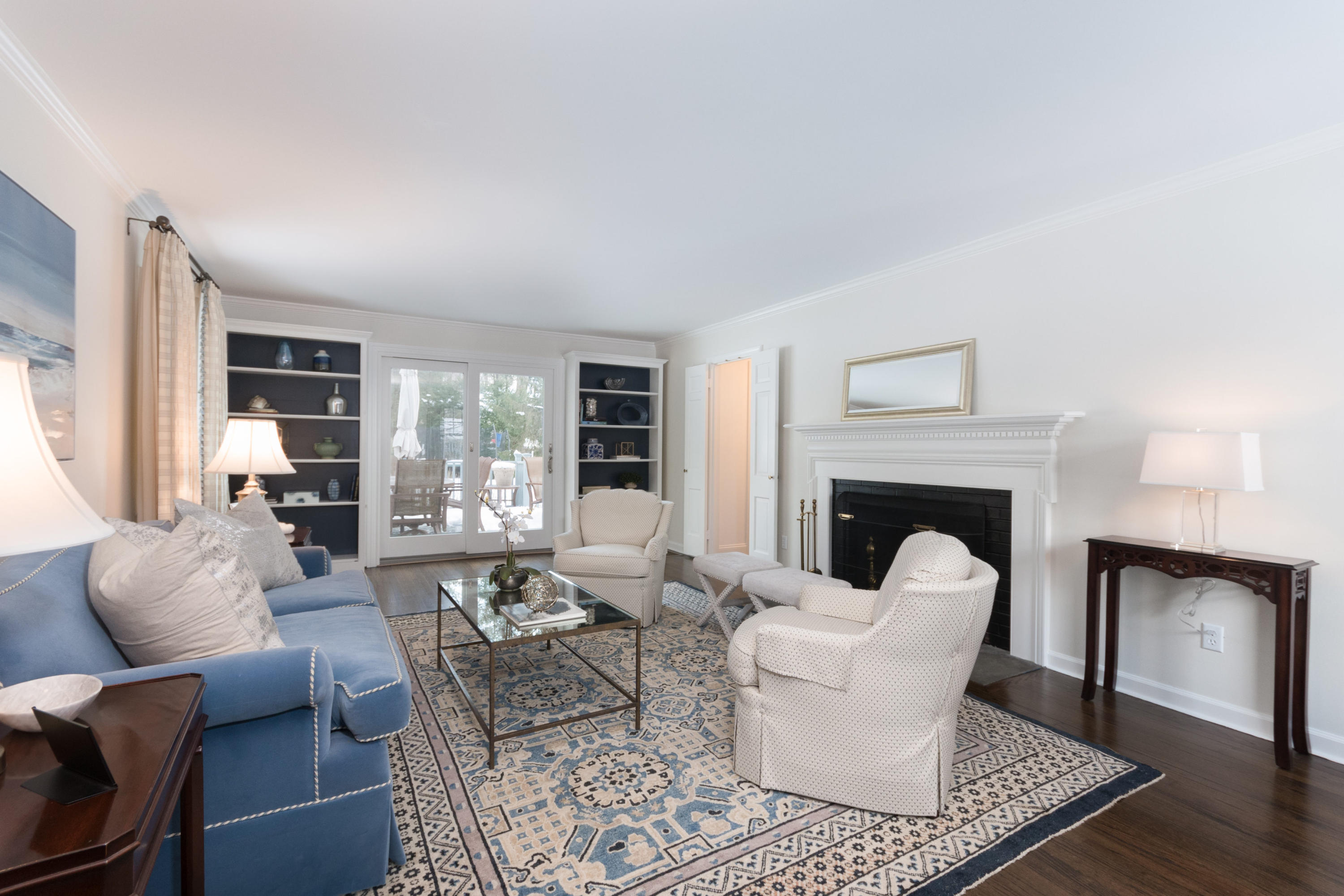 17 Country Club Road Darien, CT 06820 - Photo 5 of 37 a living room with furniture and a fireplace