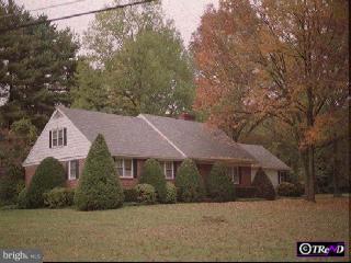 210 Spring Road Malvern, PA 19355 - Photo 1 of 1 a front view of a house with a yard