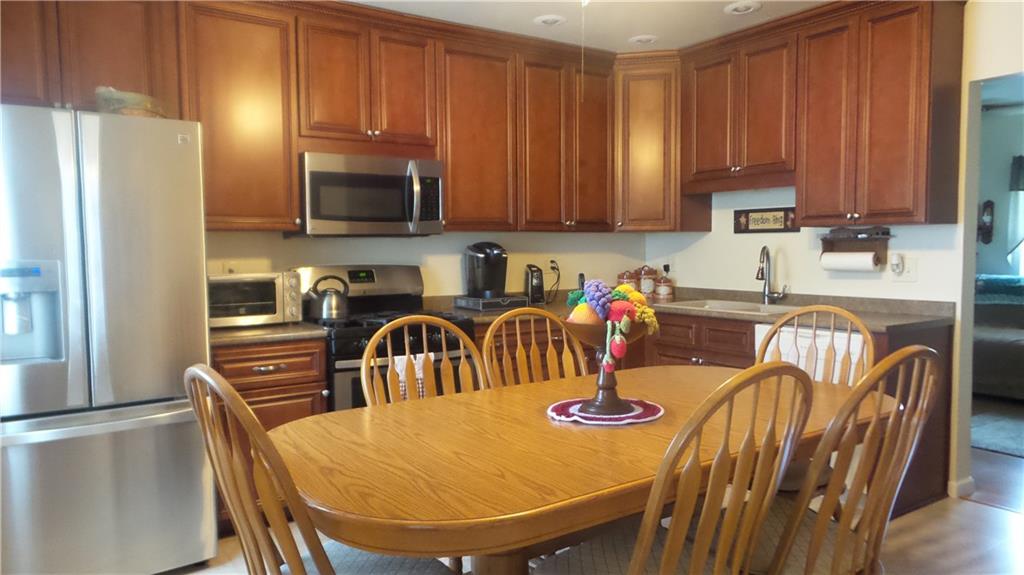 10840 Old Trail Road North Huntingdon, PA 15642 - Photo 5 of 20 Beautifully renovated Eat in kitchen with all stainless steel appliances included
