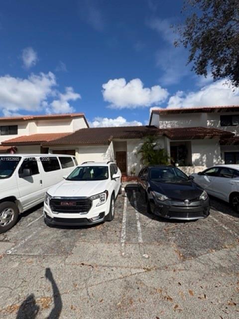 13521 Southwest 62nd Street, Unit 119 Miami, FL 33183 - Photo 19 of 19 a car parked in garage