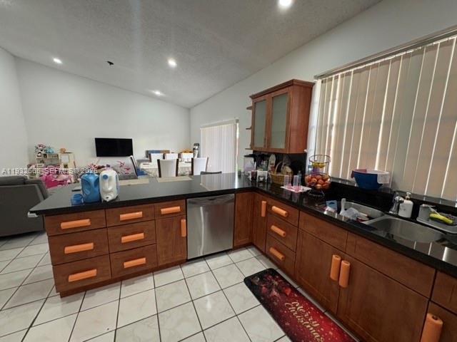 13521 Southwest 62nd Street, Unit 119 Miami, FL 33183 - Photo 7 of 19 a kitchen with stainless steel appliances granite countertop a sink counter space and a large window