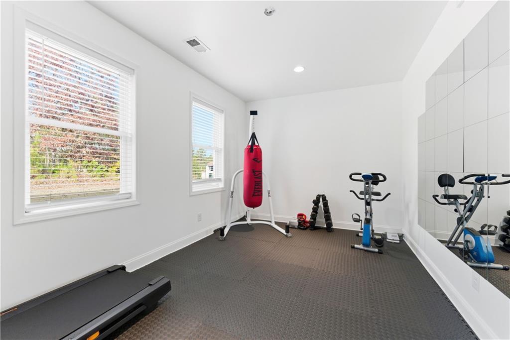 1616 Palmilla Way Southwest Stockbridge, GA 30281 - Photo 45 of 50 a view of a room with gym equipment