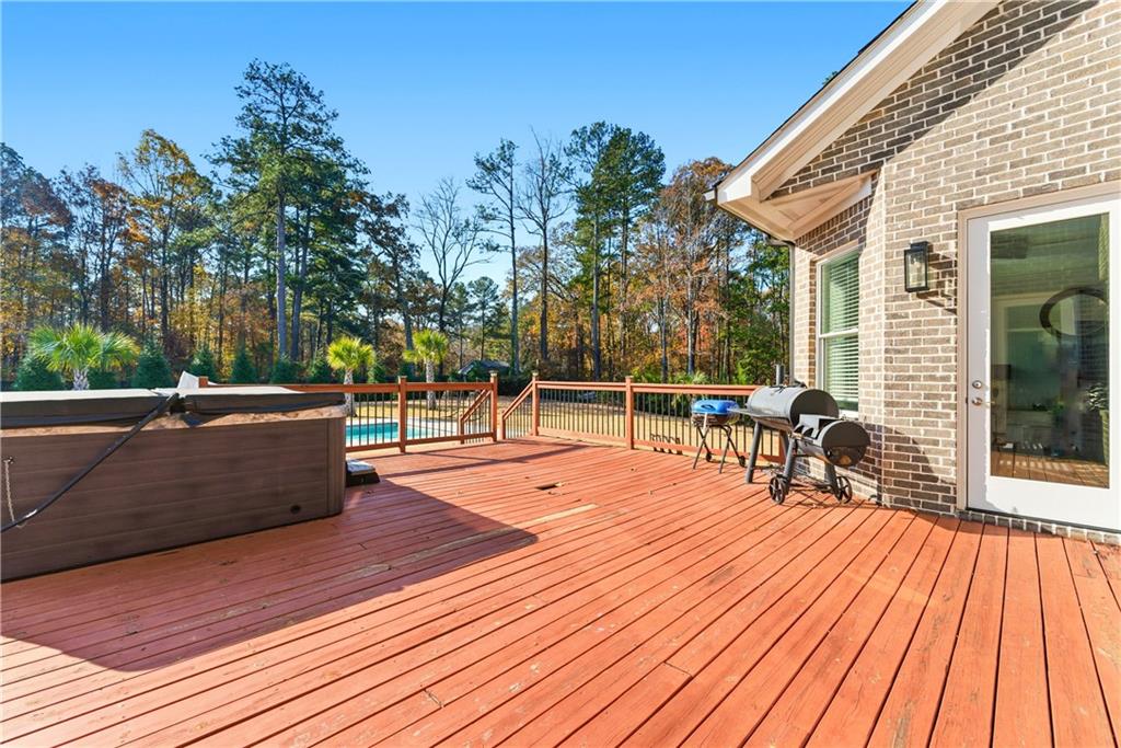 1616 Palmilla Way Southwest Stockbridge, GA 30281 - Photo 47 of 50 a view of a terrace with wooden floor and outdoor seating