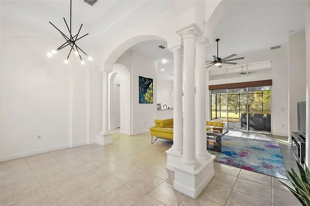 a view of an entryway and livingroom with furniture